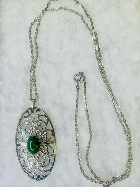 Vintage Silver Tone Filigree Pendant Necklace with Green Cabochon (c. 1968–1972)